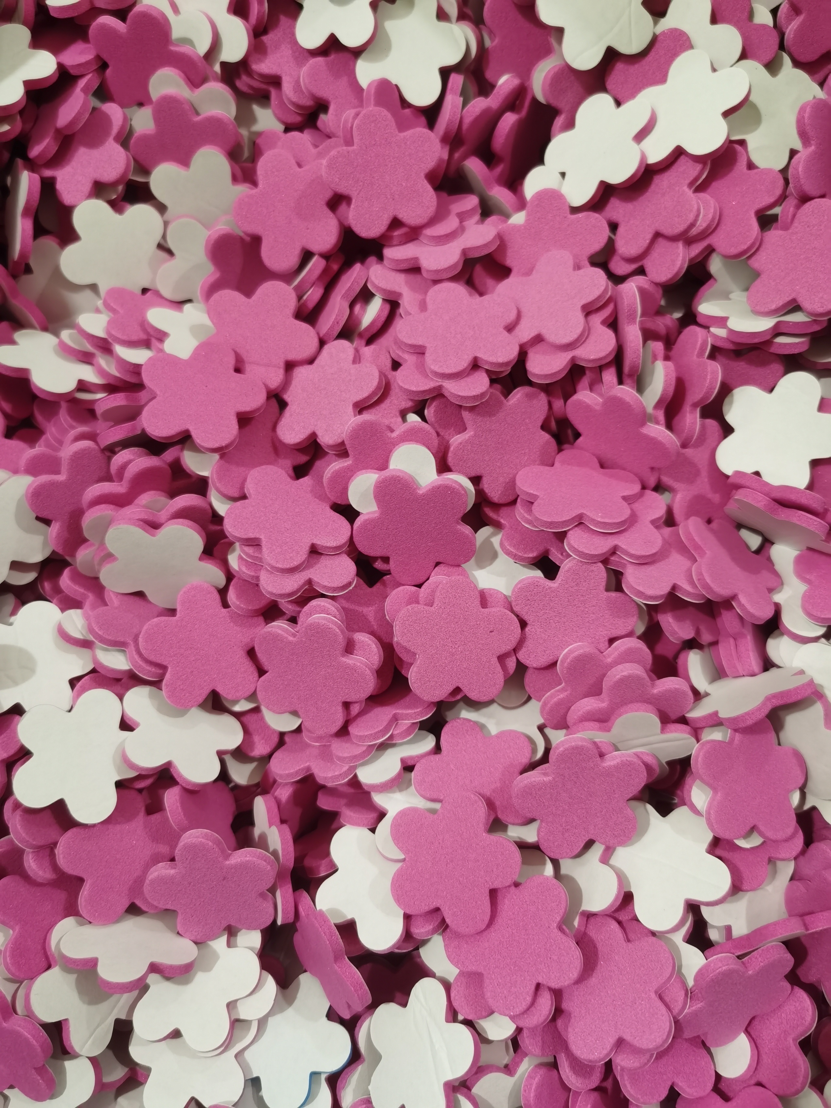 Adhesive backing for small flower patches