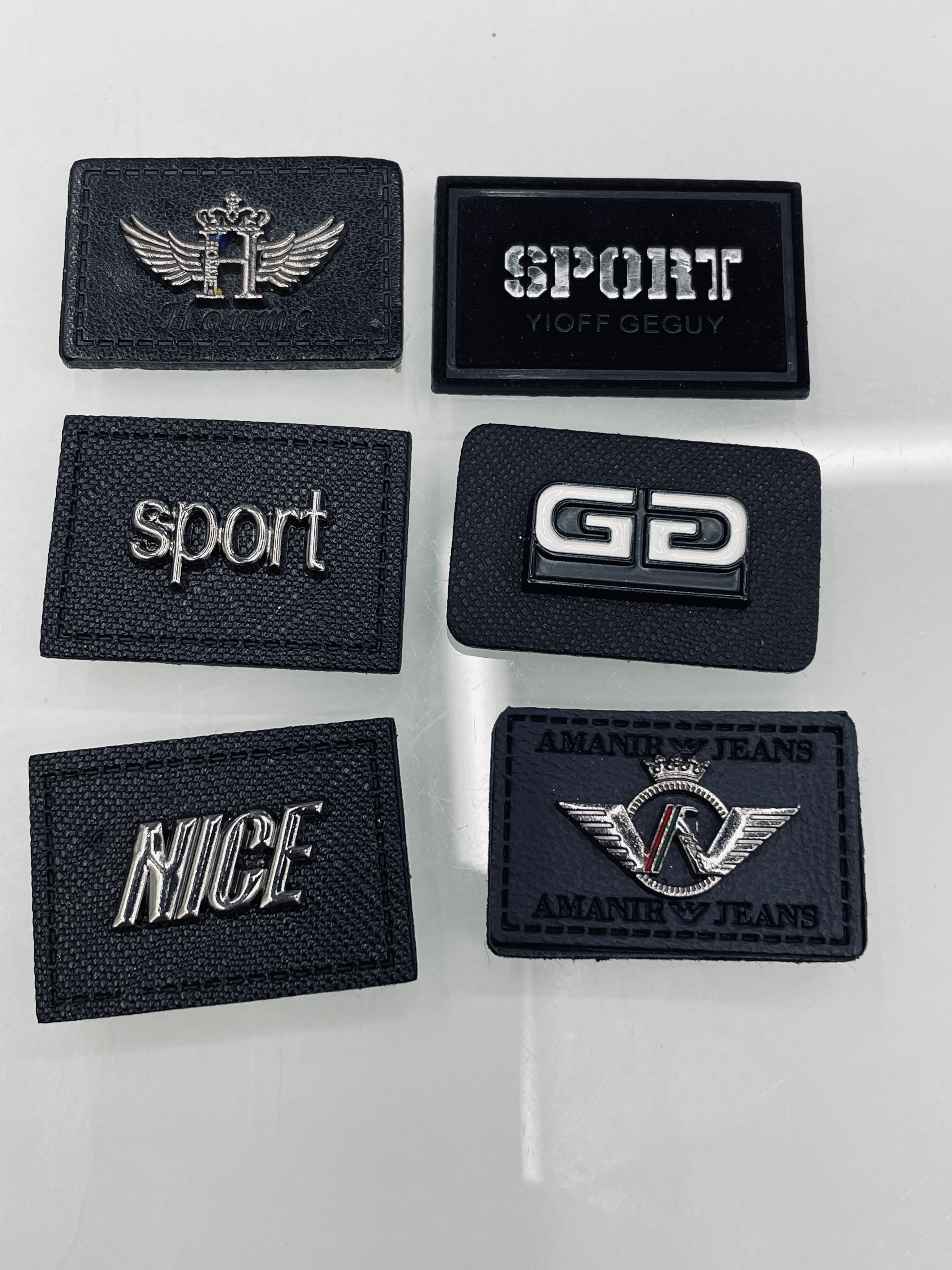 华典辅料 五金皮标金属标志 优质商标水洗标 服装辅料