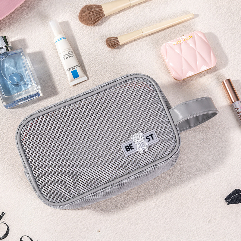 New hand-held toiletry bag, mesh portable travel skincare storage bag, beach fashion makeup bag detail image 2