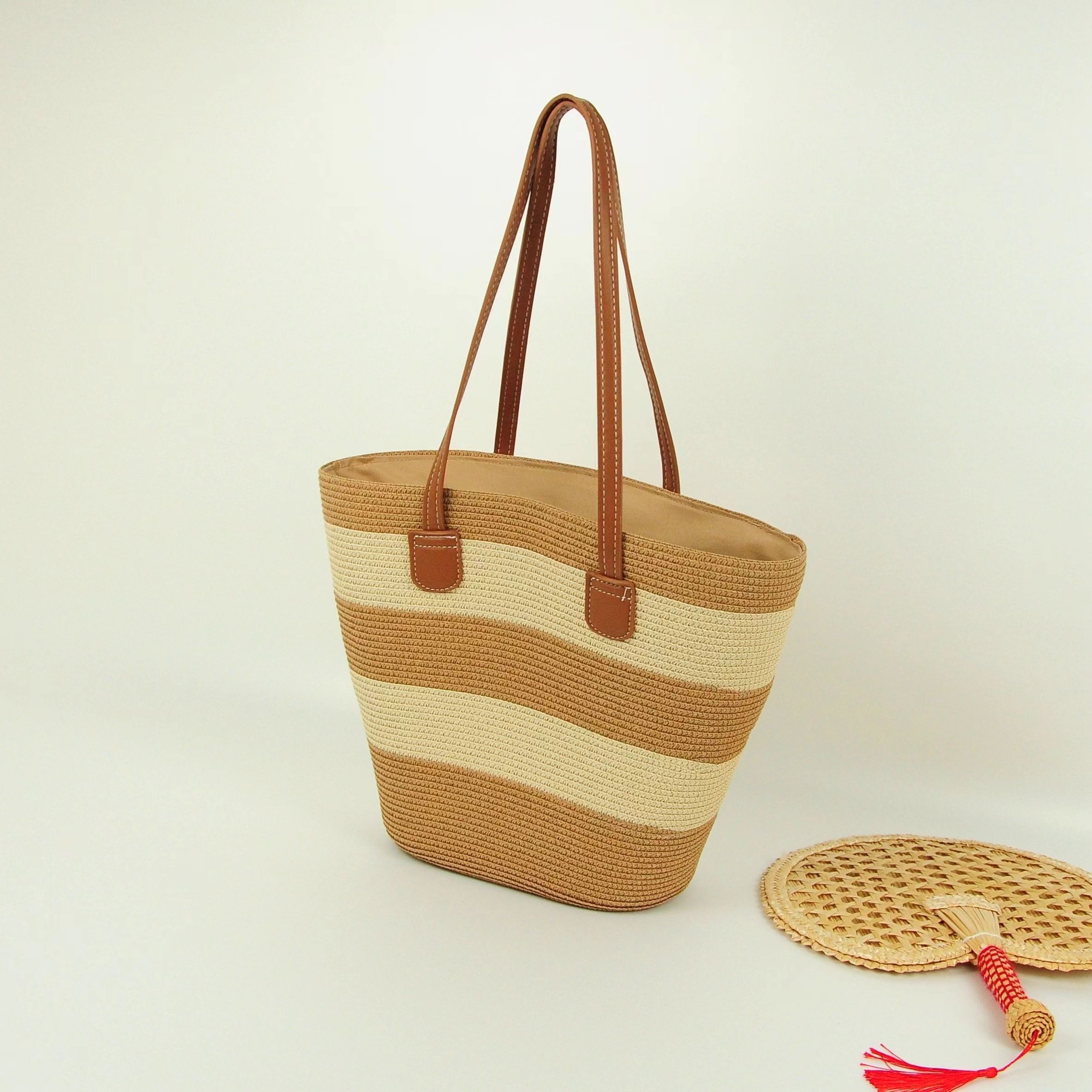 Summer new straw weaving bags, large-capacity tote bags, women's beach bags, leather shoulder straps, striped woven bags, fashionable single-shoulder bags, straw weaving bags, woven bags, women's straw weaving, artistic women's bags, women's straw weaving, popular detail image 5