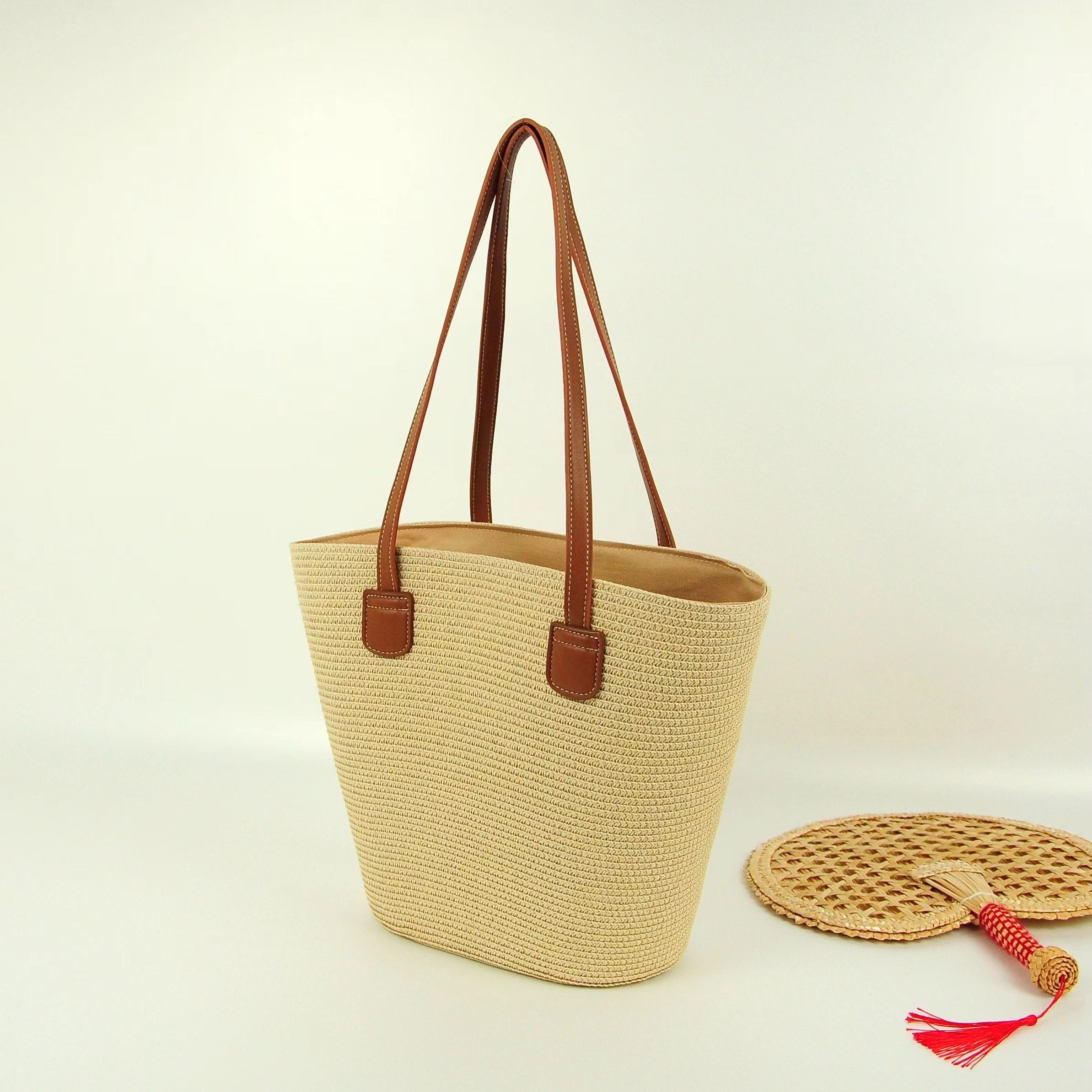 Summer new straw weaving bags, large-capacity tote bags, women's beach bags, leather shoulder straps, striped woven bags, fashionable single-shoulder bags, straw weaving bags, woven bags, women's straw weaving, artistic women's bags, women's straw weaving, popular detail image 4