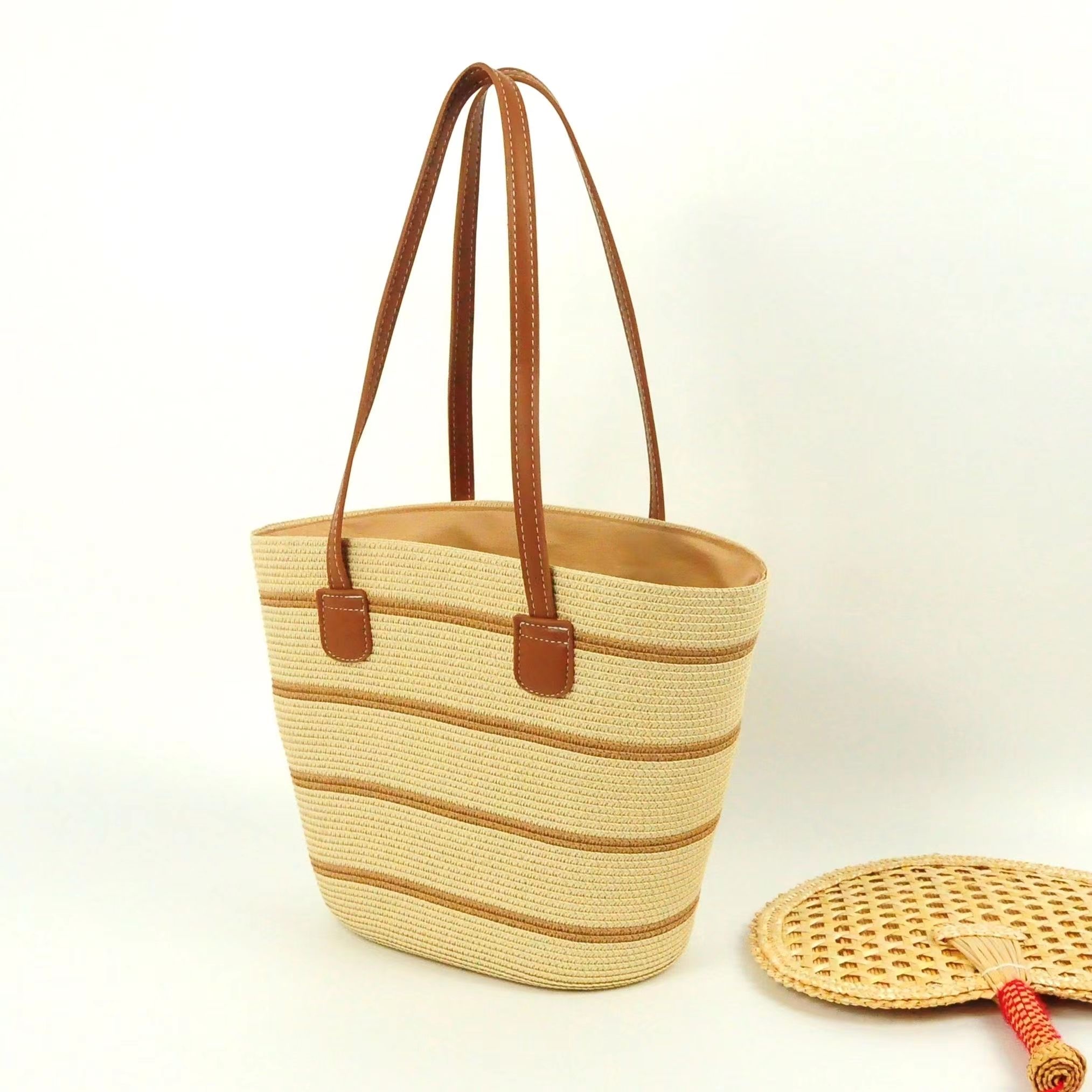 Summer new straw weaving bags, large-capacity tote bags, women's beach bags, leather shoulder straps, striped woven bags, fashionable single-shoulder bags, straw weaving bags, woven bags, women's straw weaving, artistic women's bags, women's straw weaving, popular detail image 2