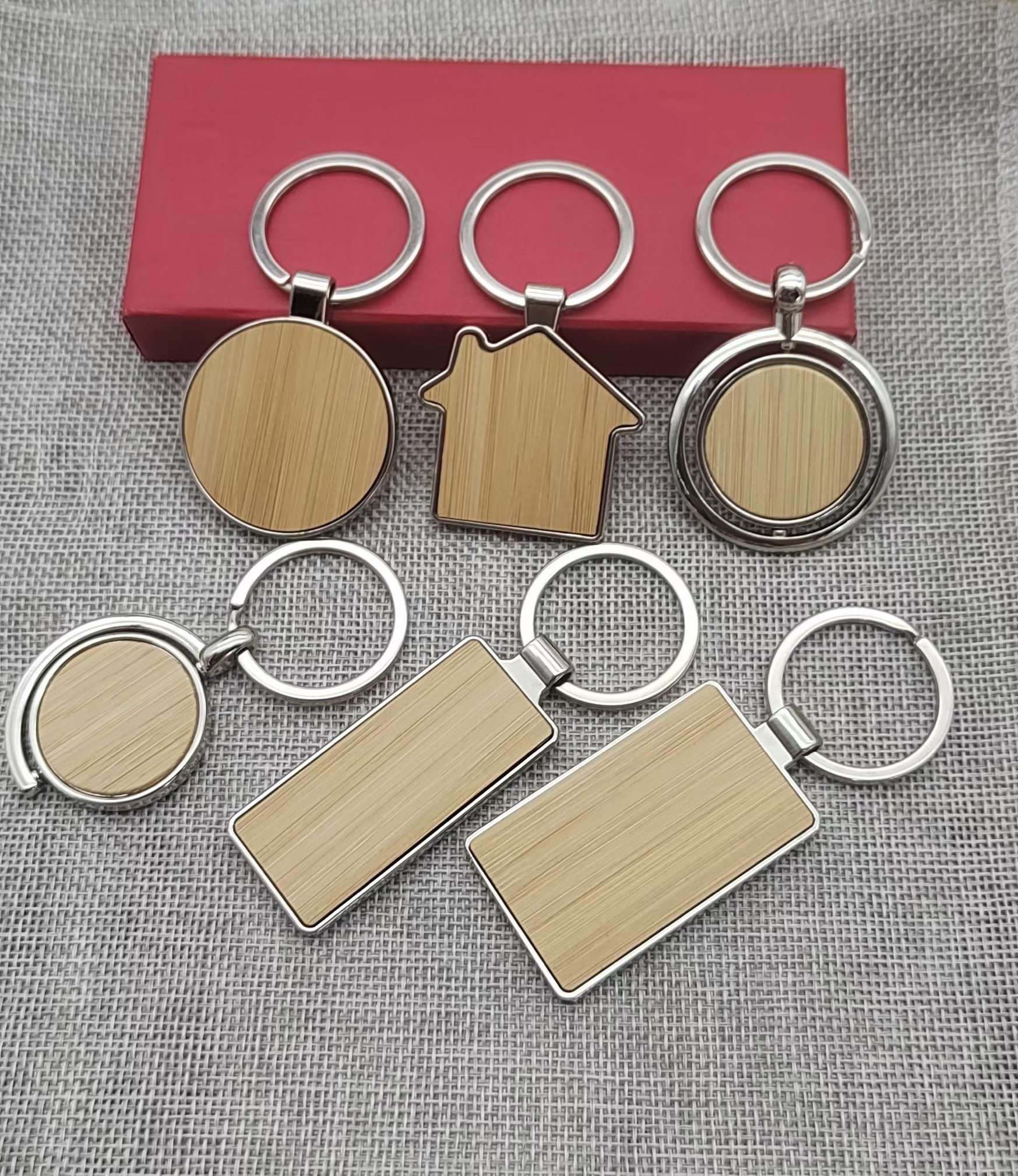 The bamboo strip advertising zinc alloy keychain can be freely replaced with logo advertising small gift keychain pendants as needed full figure