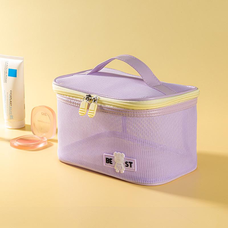 New hand-held toiletry bag with grid, large capacity, travel lipstick storage bag wholesale, beach quick-drying makeup bag Application Scenario