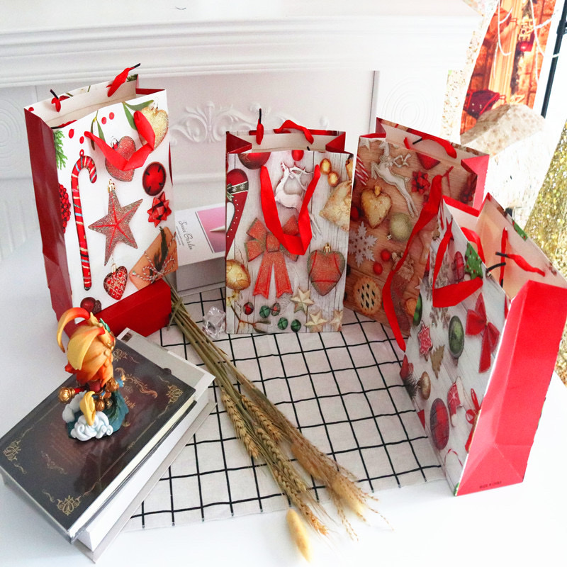 新款圣诞礼品版礼品袋 高档白卡纸袋创意撒粉中号手提袋 圣诞小号图