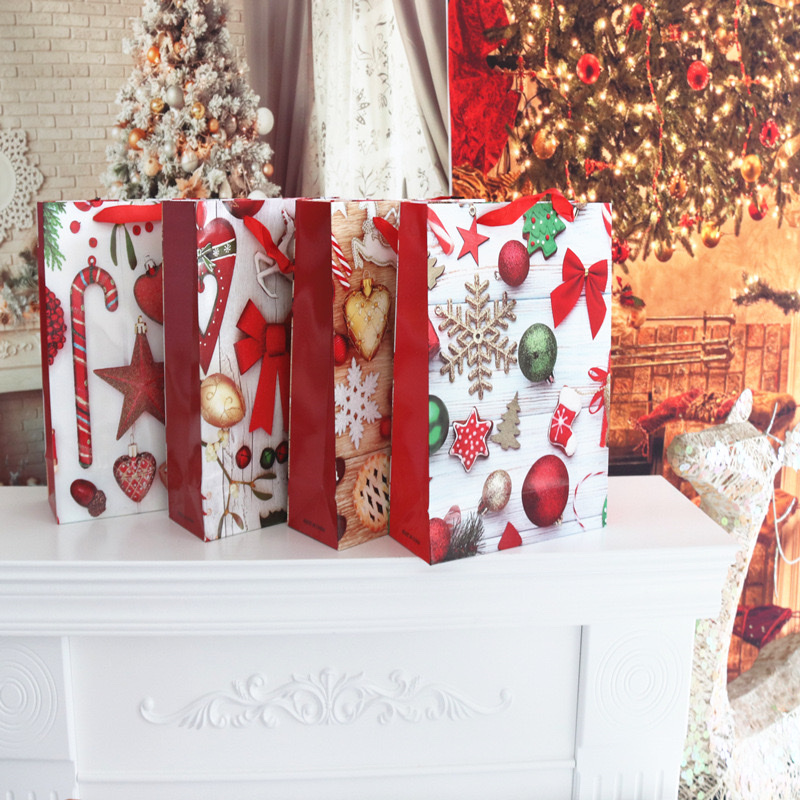 新款圣诞礼品版礼品袋 高档白卡纸袋创意撒粉中号手提袋 圣诞