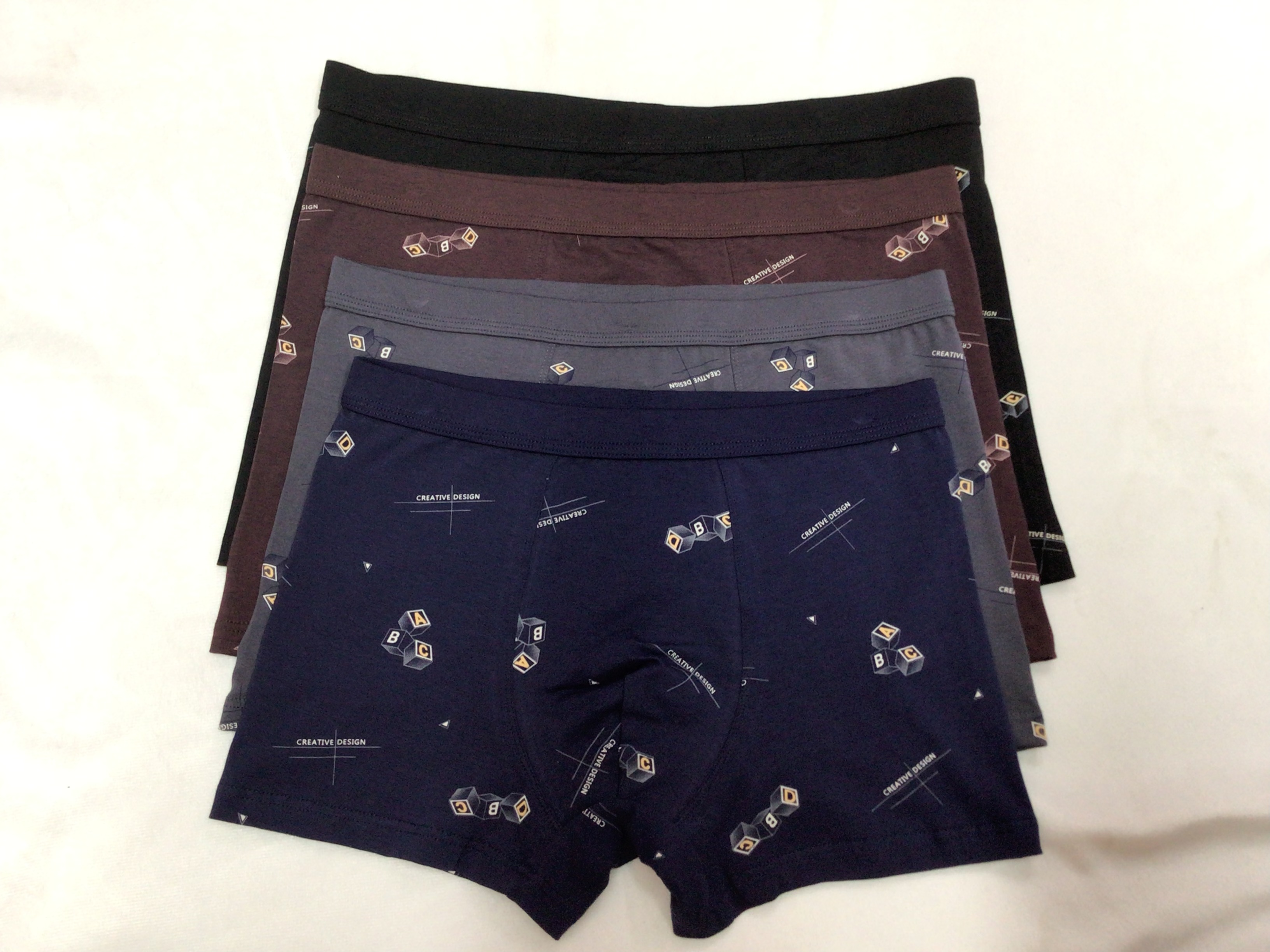 新款男士纯棉内裤字母印花四角短裤头个性潮流透气舒适四角裤裤衩白底实物图