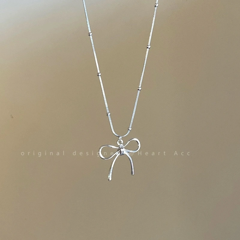 A summer bow necklace with a cold and elegant female style, a light luxury and high-end collarbone chain, a new 2024 best-selling neck chain necklace, necklace, necklace, necklace detail image 5