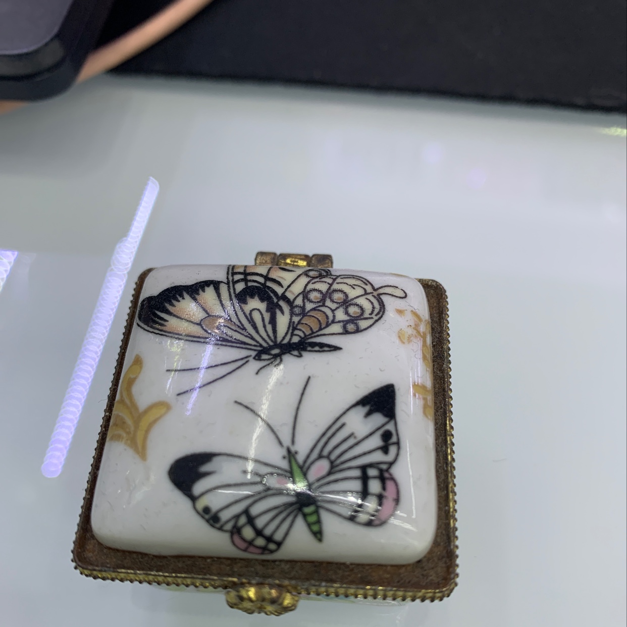 The decorative item is both aesthetically pleasing and practical for storage