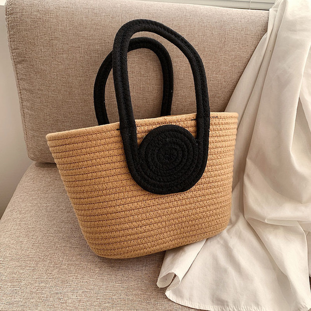 The new internet-famous best-selling handbag features a niche design, fashionable woven bag, versatile and simple handbag, small basket storage, woven bag, women's straw weaving artistic bag, women's straw weaving artistic women's bag, women's straw weaving popular detail image 2