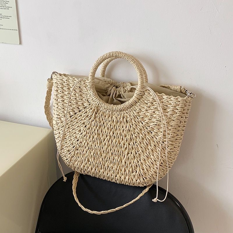 Paper rope woven bags, women's crossbody straw woven bags, small round bucket handbags, hand-woven straw woven bags, hollowed-out hand-woven bags, wholesale, customizable woven bags, straw woven bags, Lafite straw woven bags, women's straw woven bags, artistic straw woven bags Item Picture