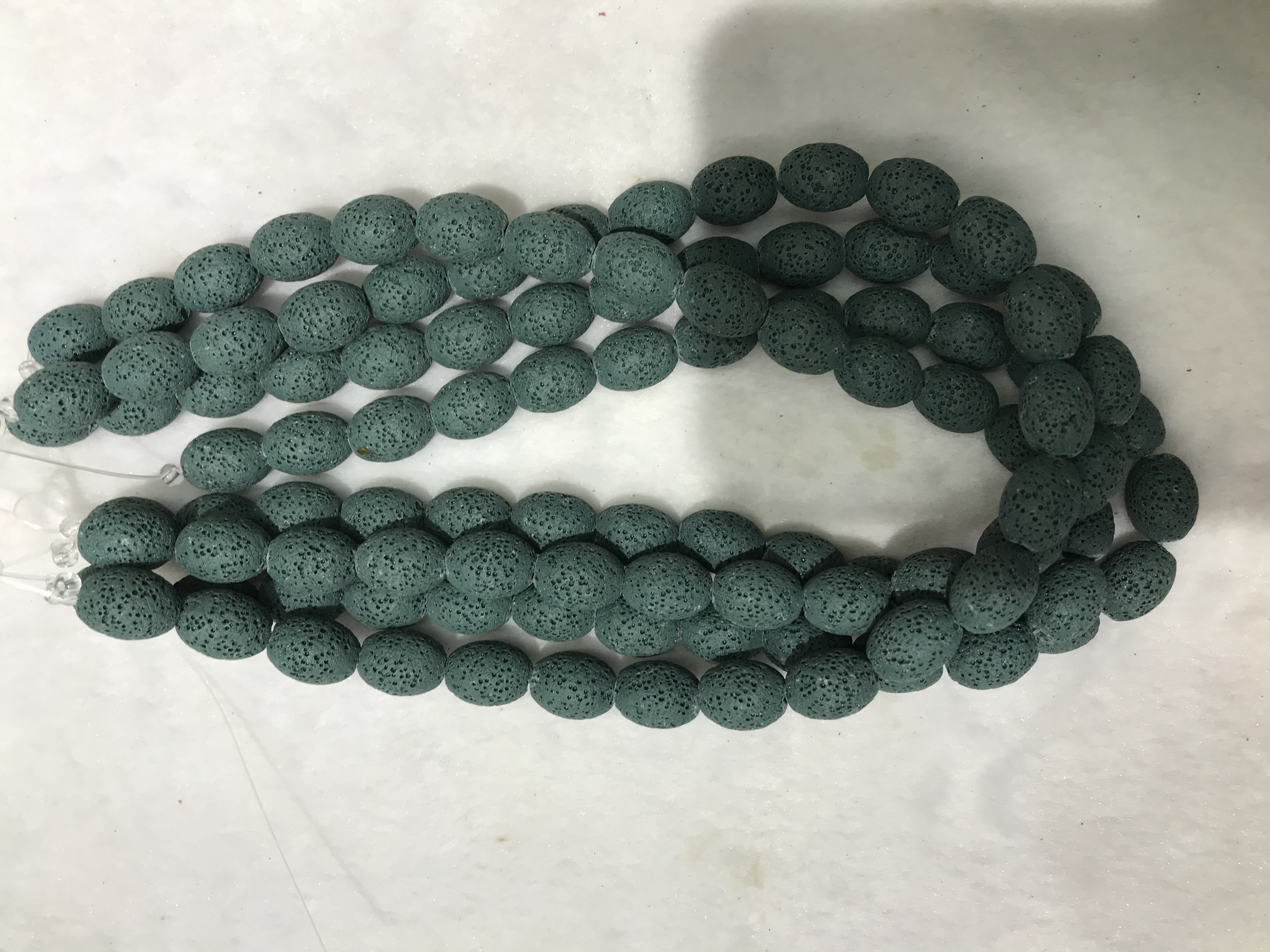 火山石8x12椭圆形浅蓝色、今年新款流行、其中这款有18个颜色、白底实物图