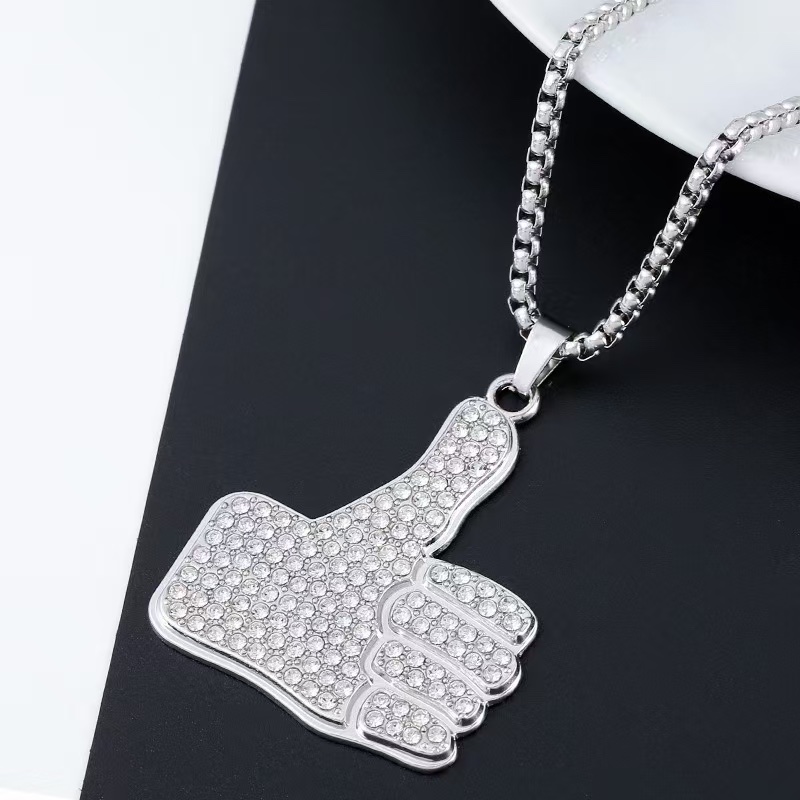 This is a popular domestic trend rapper long stainless steel and titanium steel necklace with full diamonds and a thumbs-up. It's a unisex accessory necklace for men and women