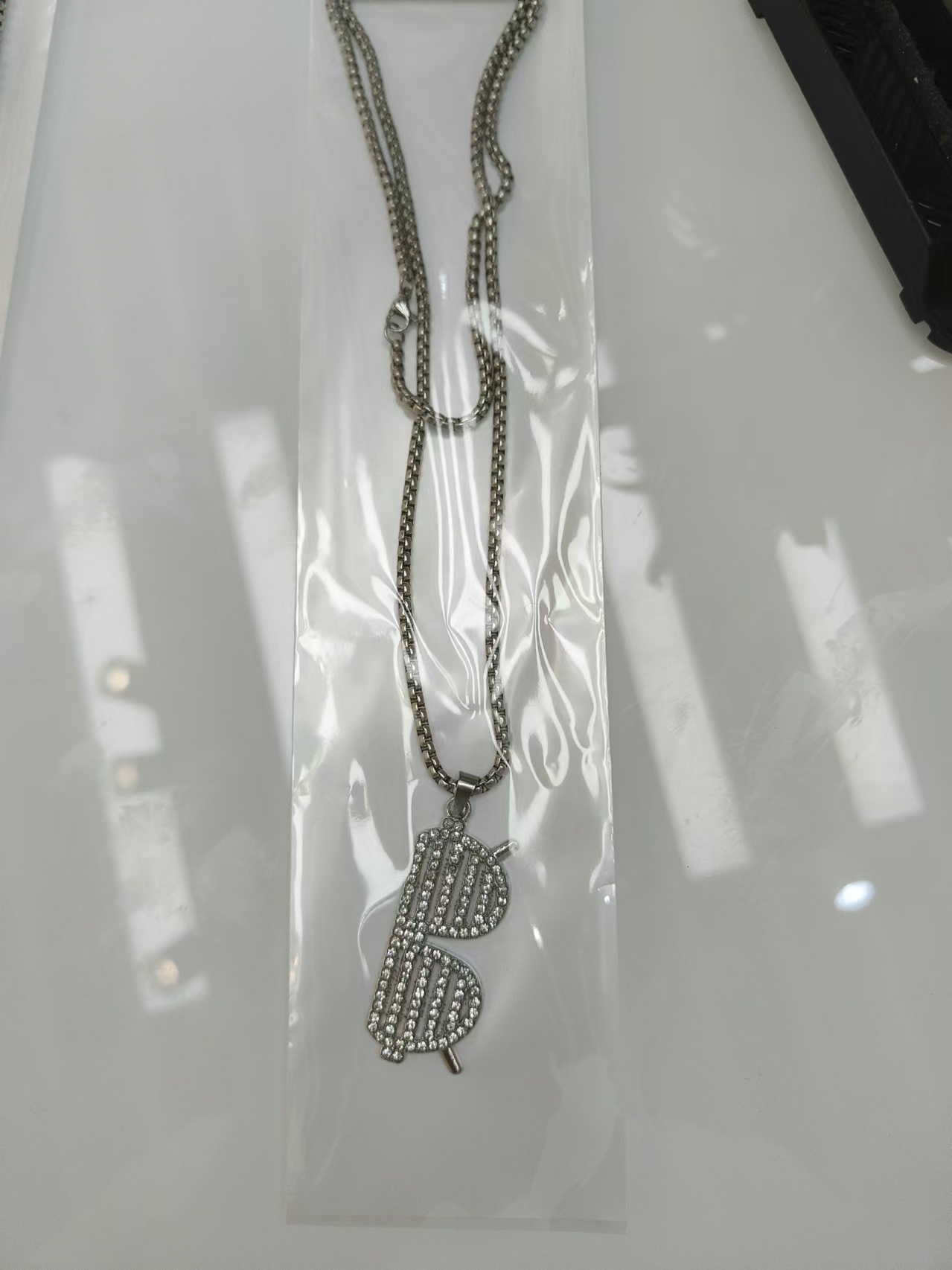 A popular domestic trend rapper long stainless steel titanium steel full diamond spectacle frame necklace, unisex accessory necklace for men and women Specification image