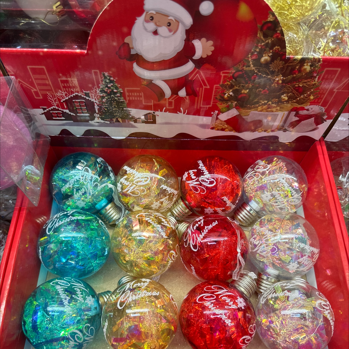 The transparent balls with lights come in 12 packages in yellow, white, red and blue color boxes