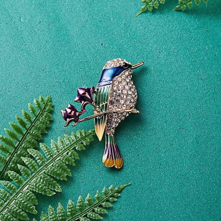 Bird brooches and corsages with European and American style alloy design, factory direct sales of imitation pearl corsages