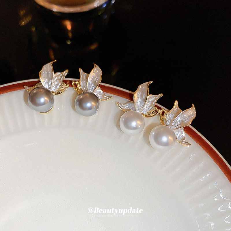 Silver needle oil-dripping pearl round earrings, Korean-style fresh and fashionable stud earrings, commuting high-end and elegant earrings wholesale Specification image
