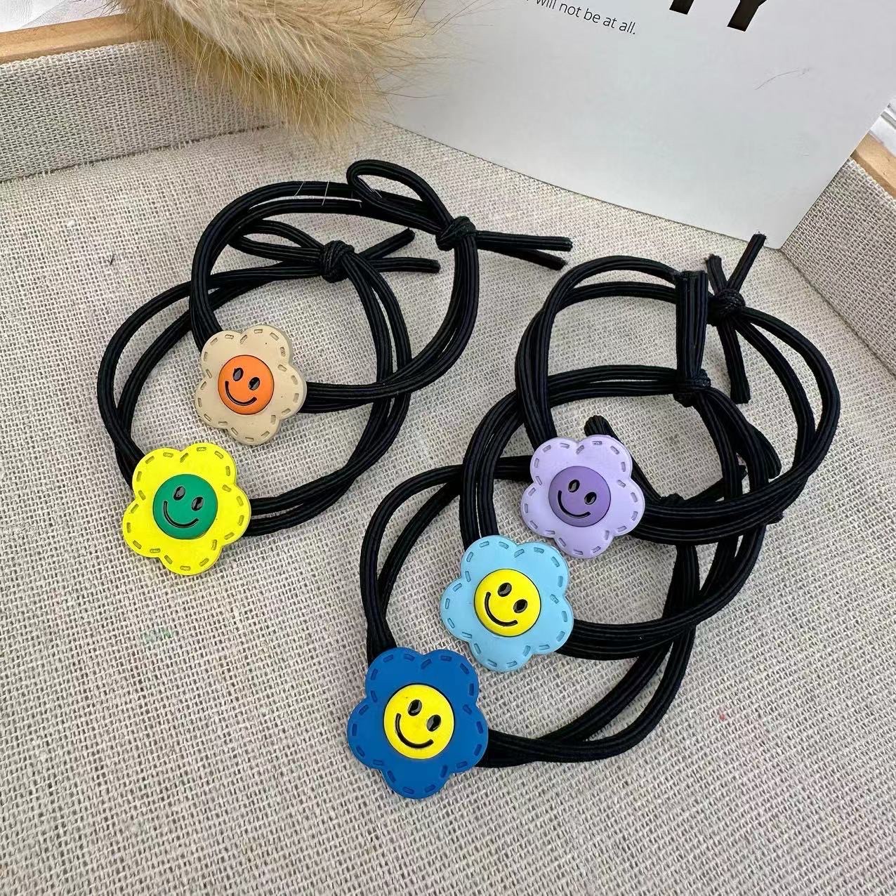 Simple smiling face alloy hair tie for women, Korean style, versatile and elegant hair band, new high-end style ponytail leather band hair tie headwear, hair tie leather band