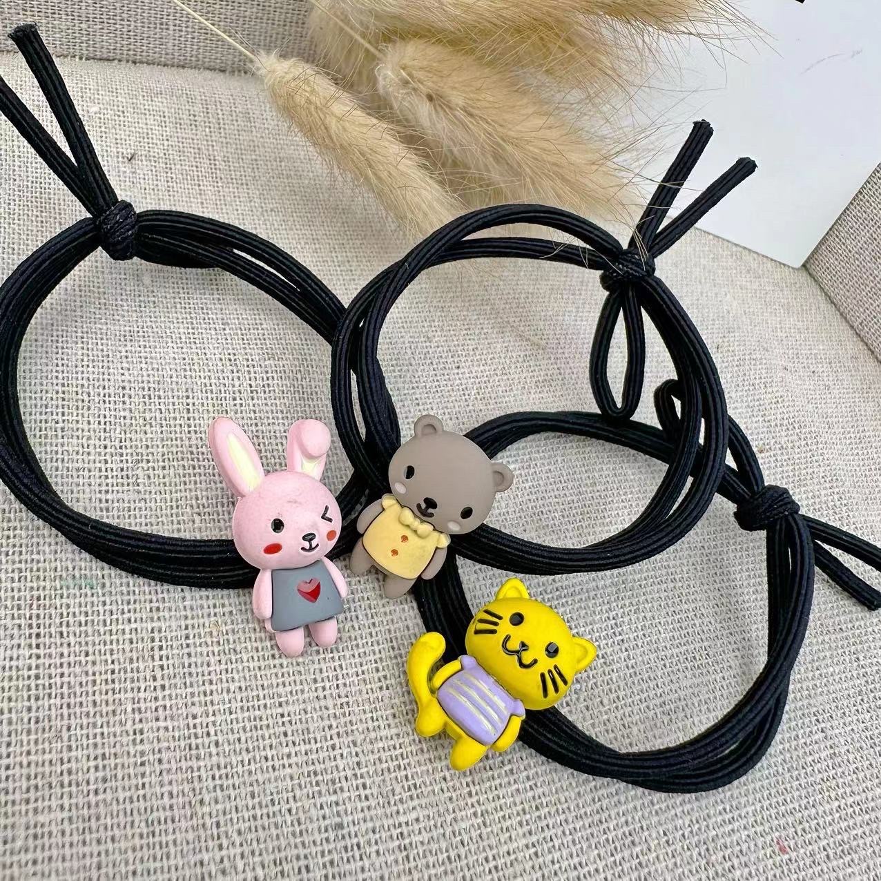 Simple smiling face alloy hair tie for women, Korean style, versatile and elegant hair band, new high-end ponytail leather band hair tie headwear Specification image
