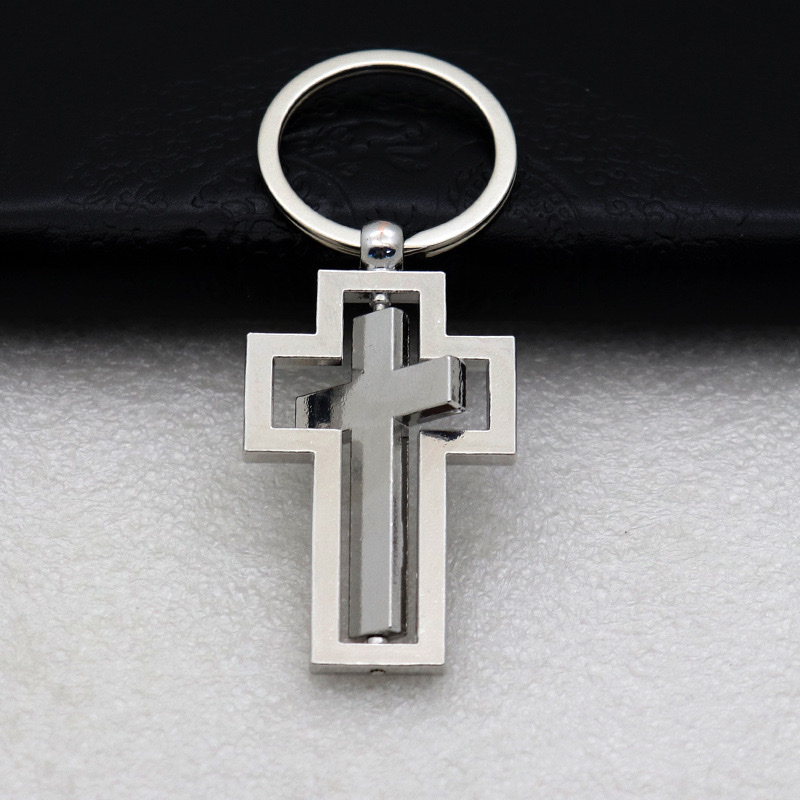 Rotating cross cross-border supply in stock, new rotating metal fun men's and women's car bags, keychains and accessories detail image 7