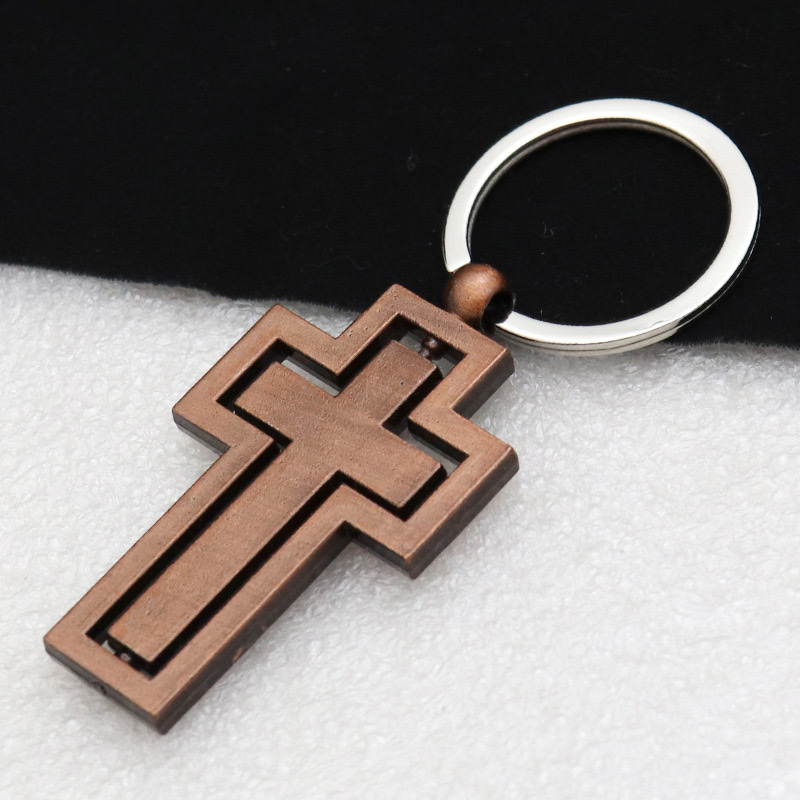 Rotating cross cross-border supply in stock, new rotating metal fun men's and women's car bags, keychains and accessories detail image 10