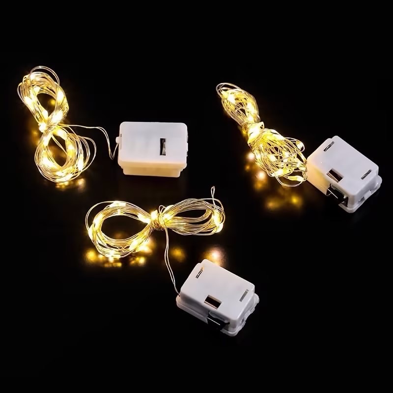 Small white box colored lights, flower bouquets, gift boxes, decorative atmosphere lights, Christmas decorations details Picture