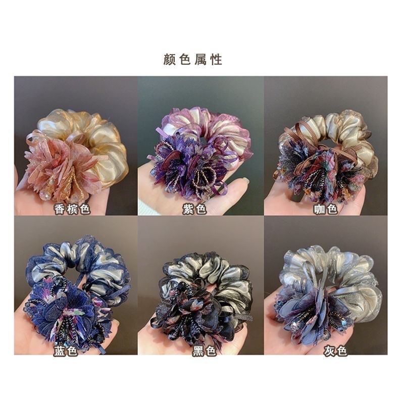 The Korean-style hair tie for women is fashionable and elegant. It exudes a sense of style. The hair tie is coiled, and the hair band is a silk headwear. It is trendy