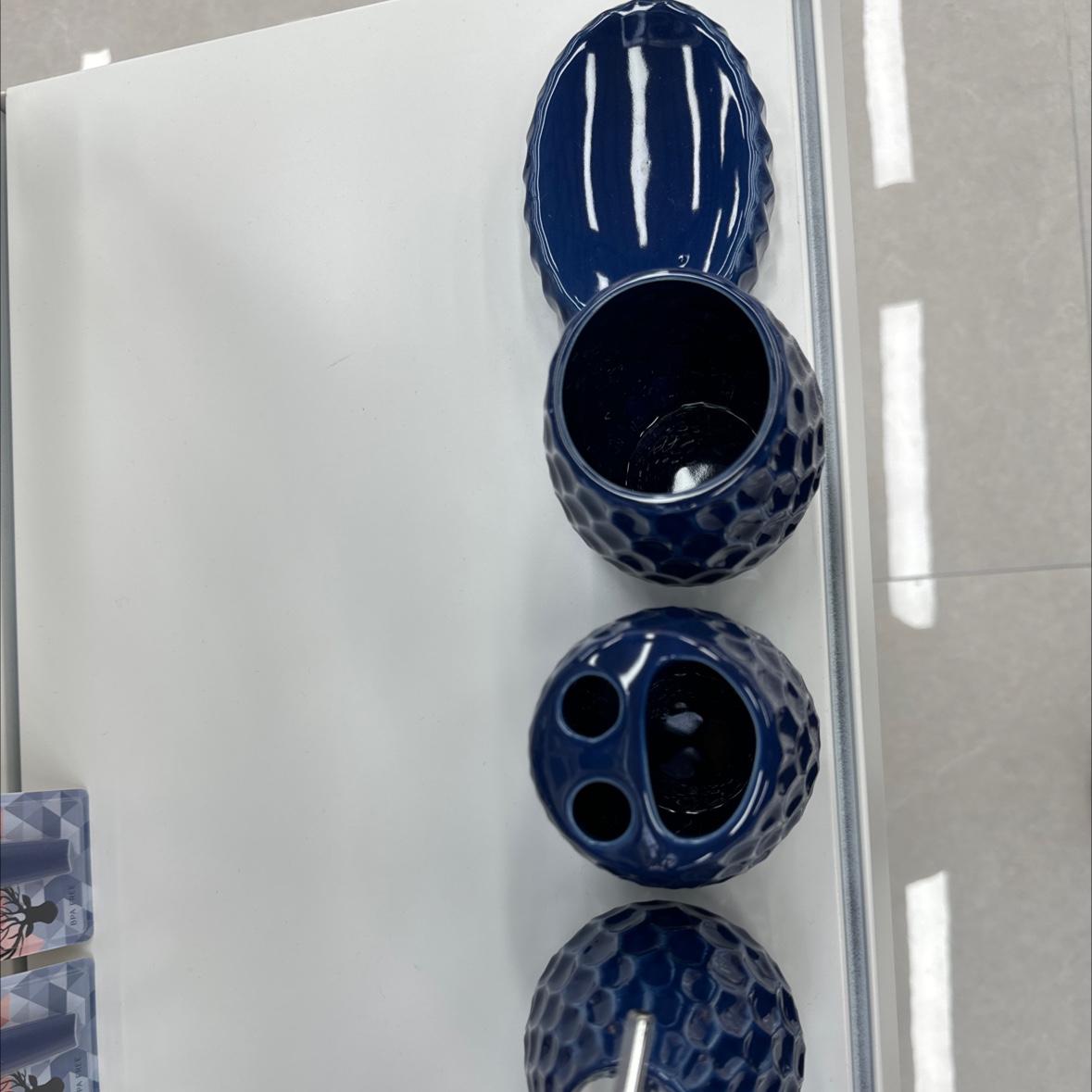 White faucet and accessories display