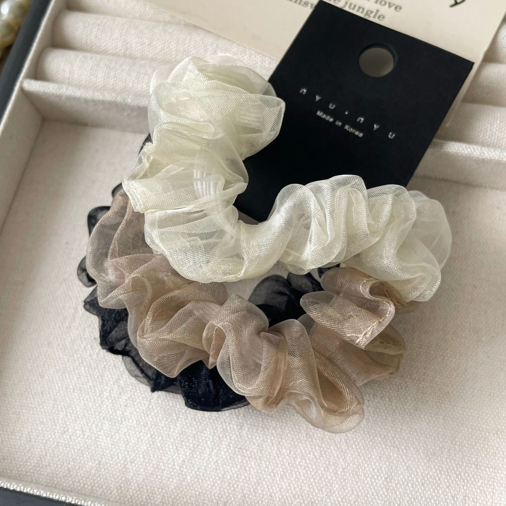 This is a new sweet and gentle Korean summer style double-layer mesh large intestine hair band with a simple and ladylike charm. It can be used to tie up hair detail image 4