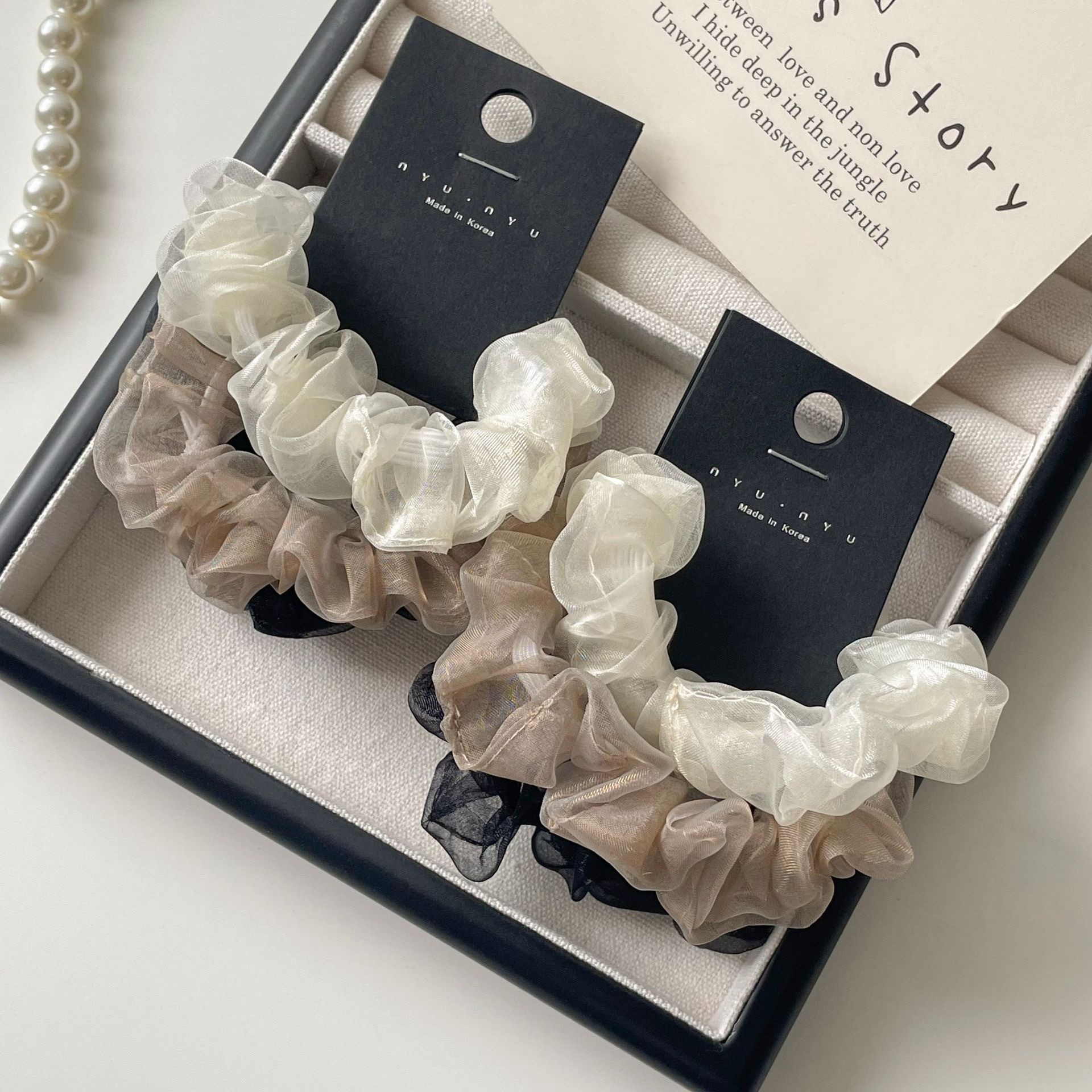 This is a new sweet and gentle Korean summer style double-layer mesh large intestine hair band with a simple and ladylike charm. It can be used to tie up hair detail image 6