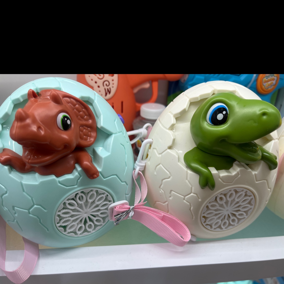 萌趣立体卡通恐龙、多孔设计出泡五彩缤纷、逼真的恐龙音效、LED灯光、恐龙蛋造型电动泡泡机详情图2