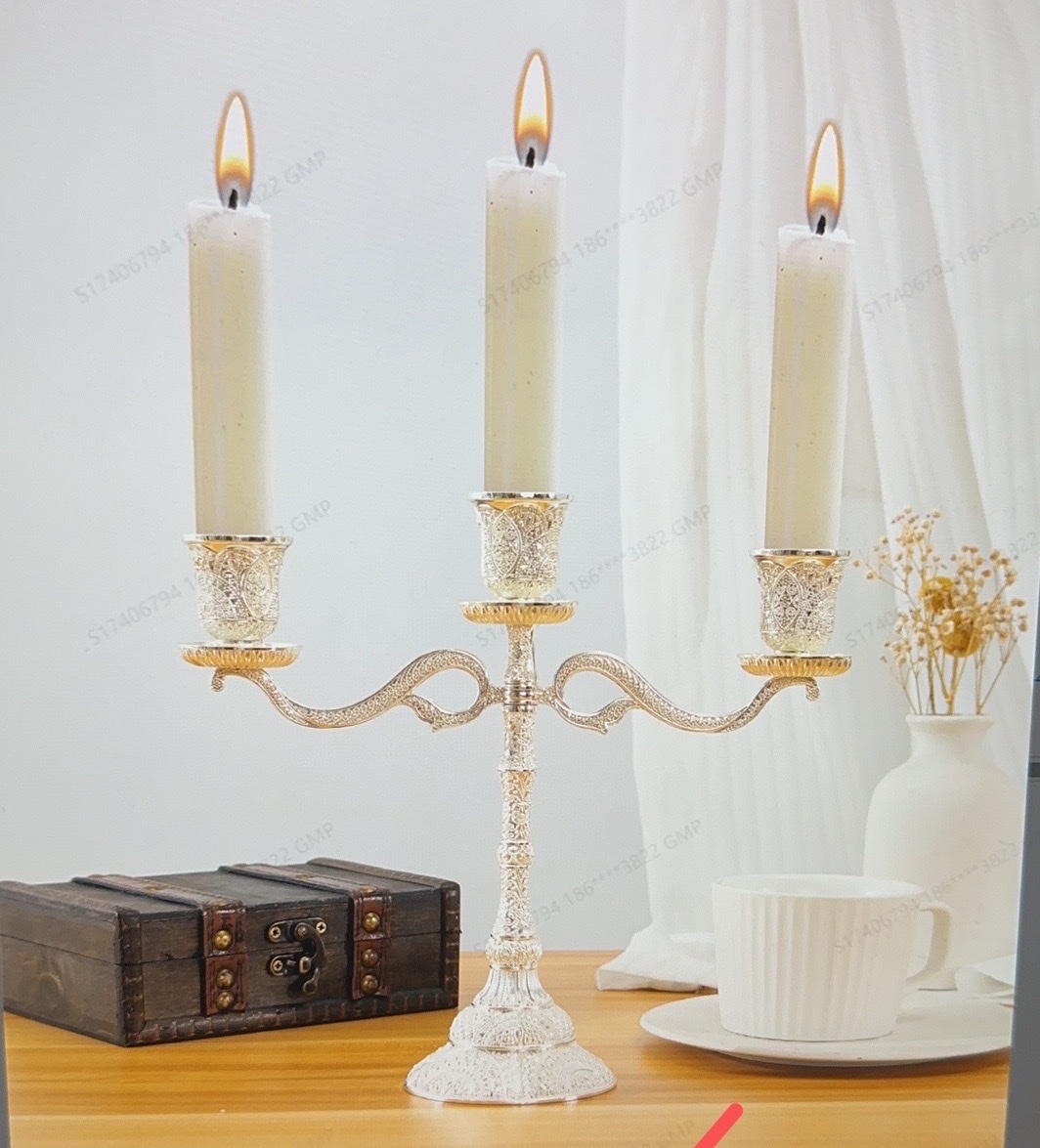 The candlestick is golden and silver-white details Picture