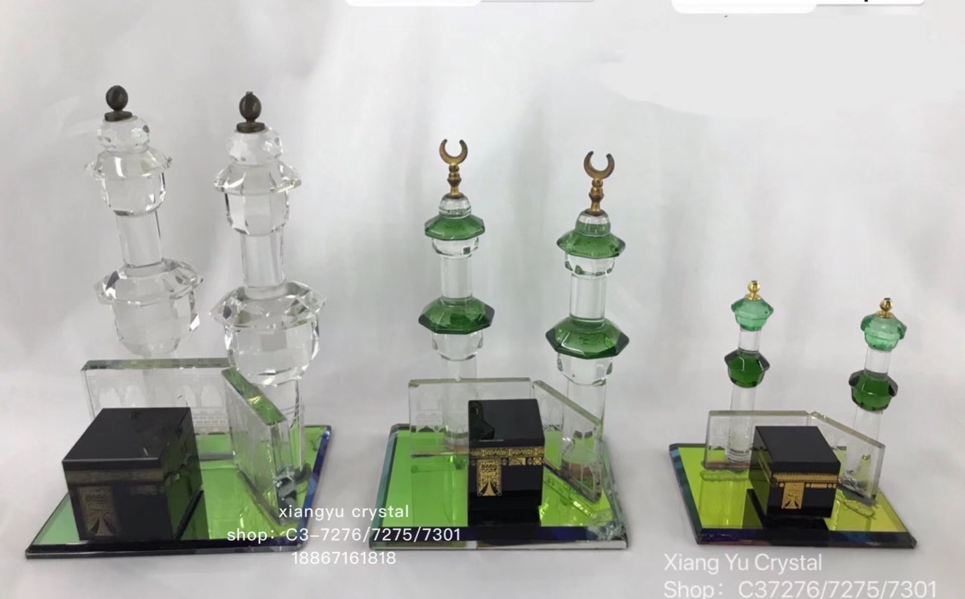 Crystal handicraft ornaments, with a green base plate, featuring a black house and two pillars, have a unique style combination