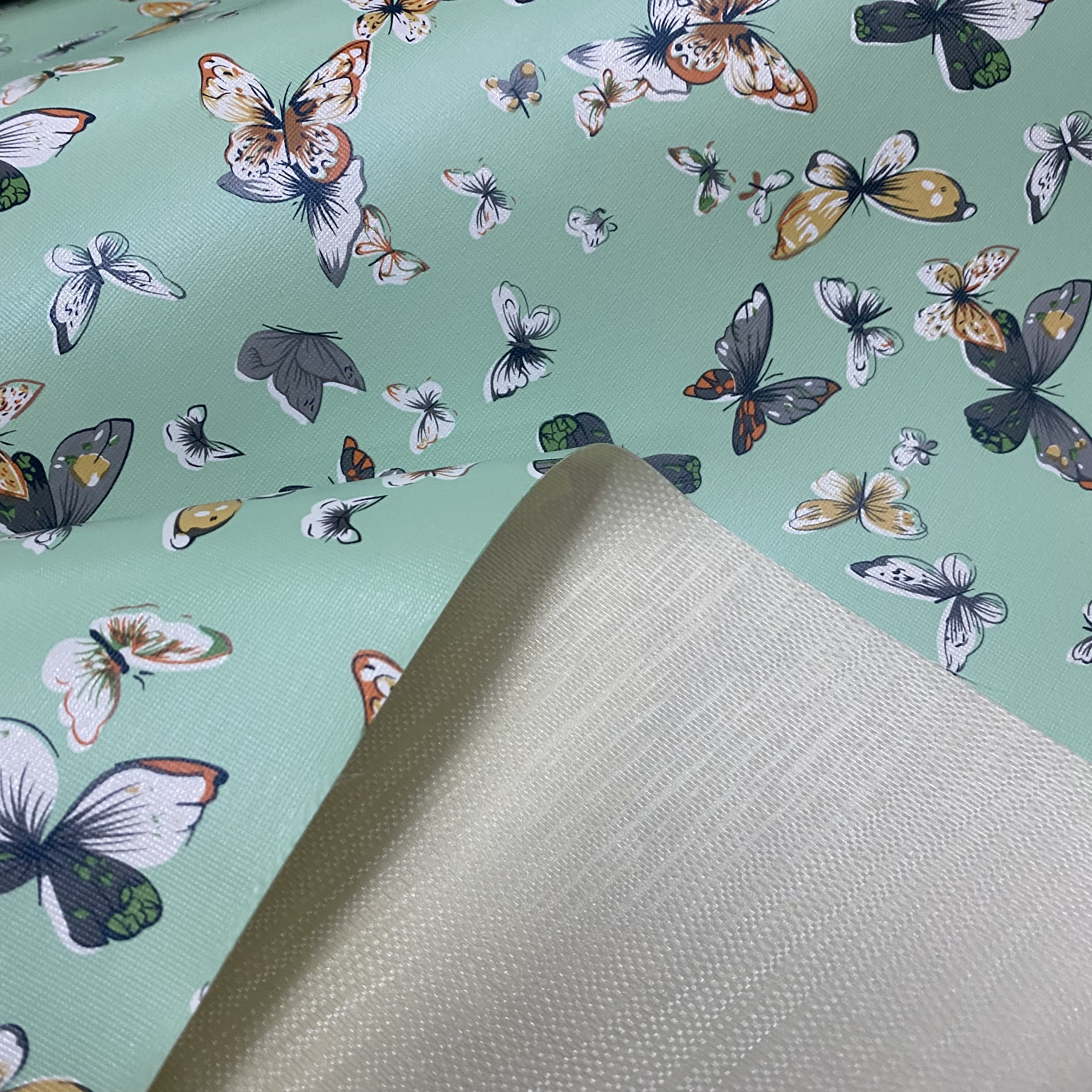 装饰革/布纹装饰革/背胶皮革料/皮革料pu皮革/pvc网白底实物图