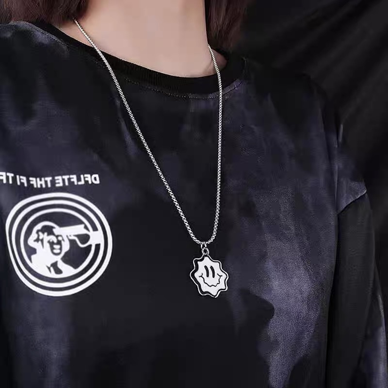 Factory direct sales of DUKATO's new original design cartoon smiley face pendant, double-color hip-hop couple titanium steel necklace detail image 3