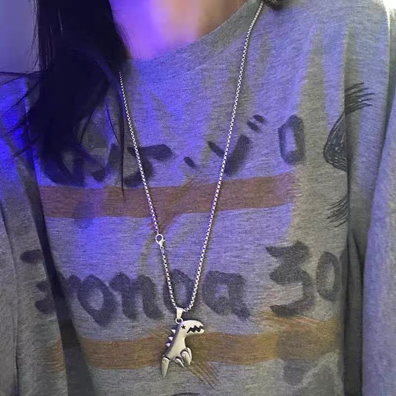 Factory direct sales of DUKATO's new product, cute little dinosaur pendant necklace for students, cold style, versatile titanium steel jewelry for Instagram hip-hop men detail image 4