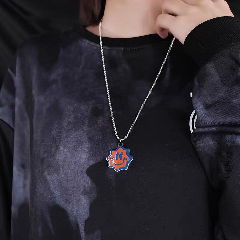 Factory direct sales of DUKATO's new original design cartoon smiley face pendant, double-color hip-hop couple titanium steel necklace detail image 5