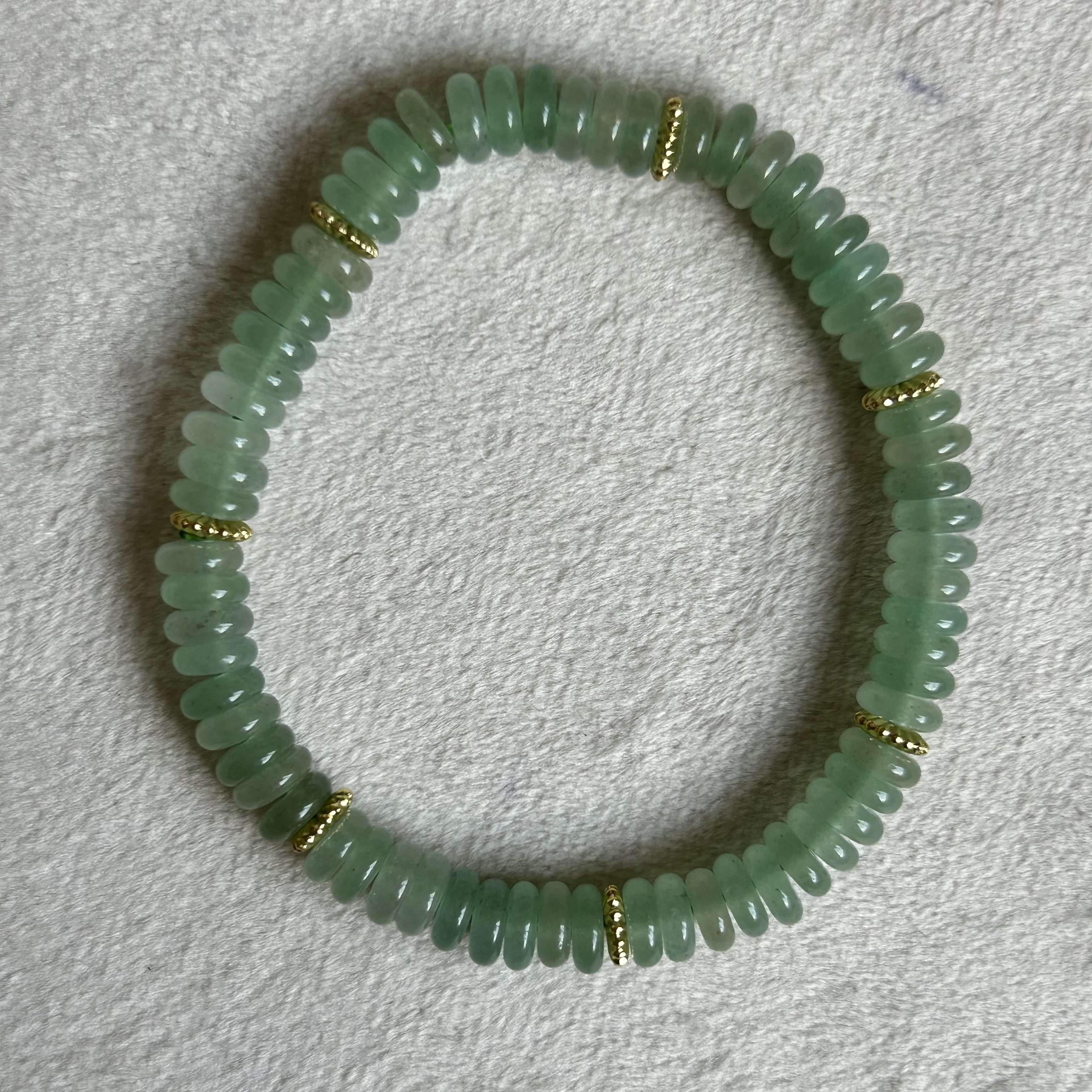 This jade bracelet features a fashionable and simple style, a high-end feel, and is a jewelry gift