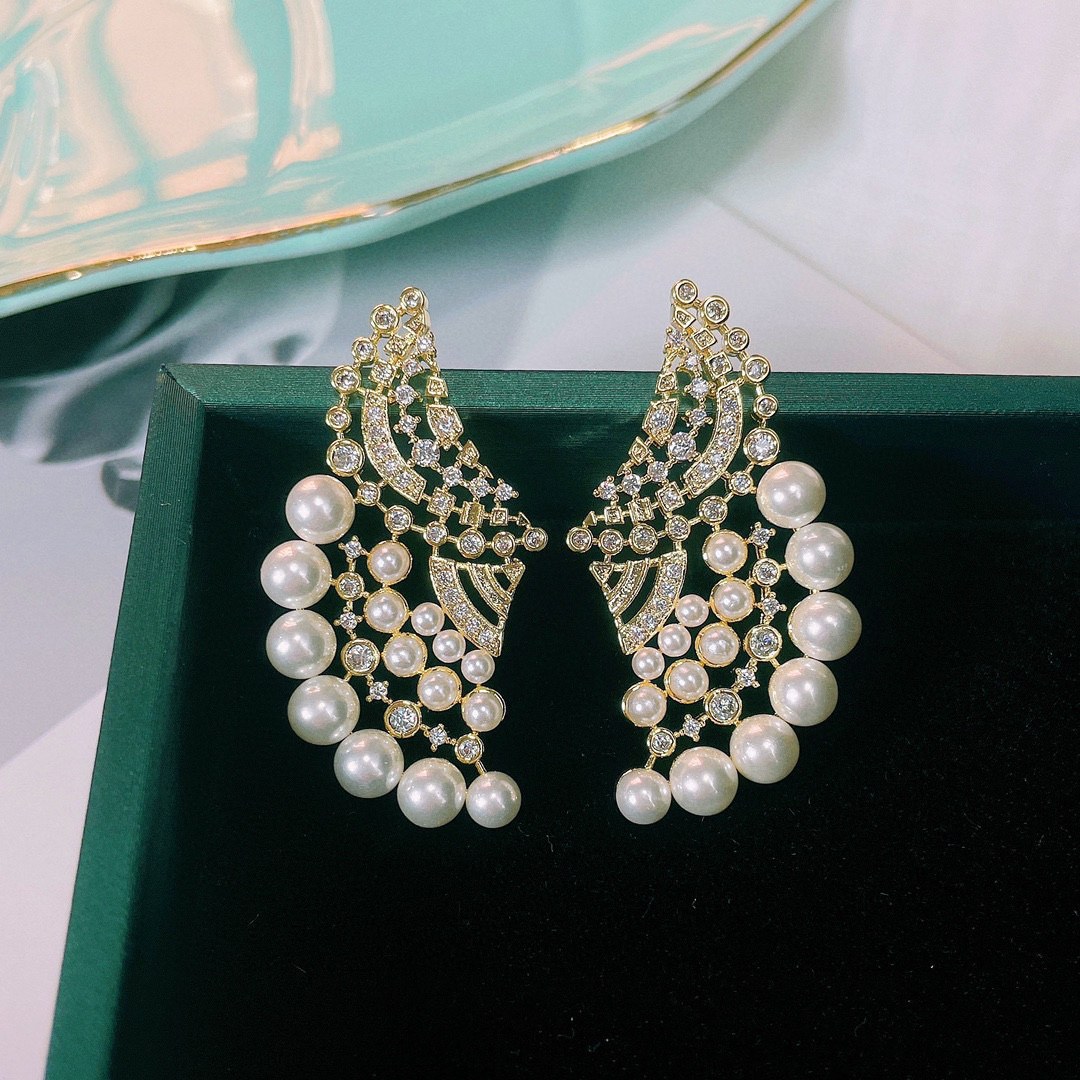 秀美一族简约百搭轻奢明星迪丽热巴同款御木本扇形珍珠耳环 银针条码价123耳饰详情图2