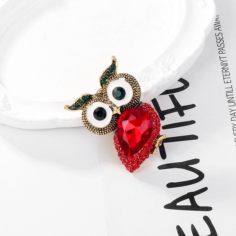 The Owl xi o Pokemon series rose brooch is decorated with blue zircon and features a zircon crown design that is exquisite and fashionable detail image 6