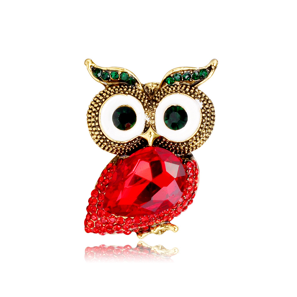 The Owl xi o Pokemon series rose brooch is decorated with blue zircon and features a zircon crown design that is exquisite and fashionable details Picture