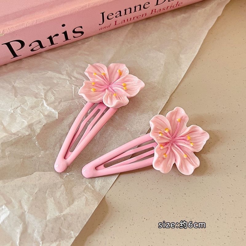 Pink cherry blossom hair clips, a sweet Korean girl's bangs clip headwear, a cute children's peach blossom hair clip edge hair tie detail image 4
