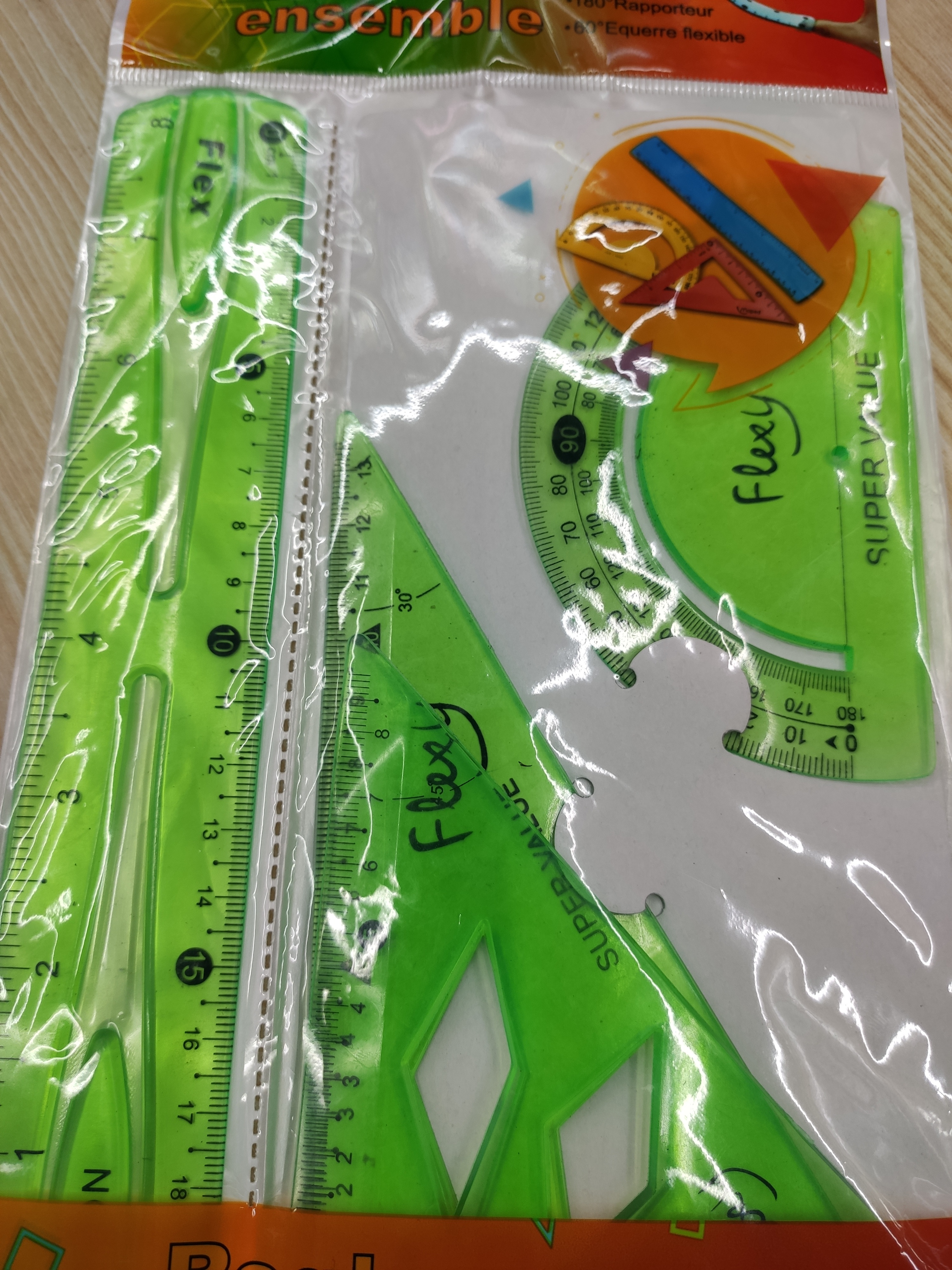 Students measure angles with a set of four rulers, a set of set squares and a ruler Specification image