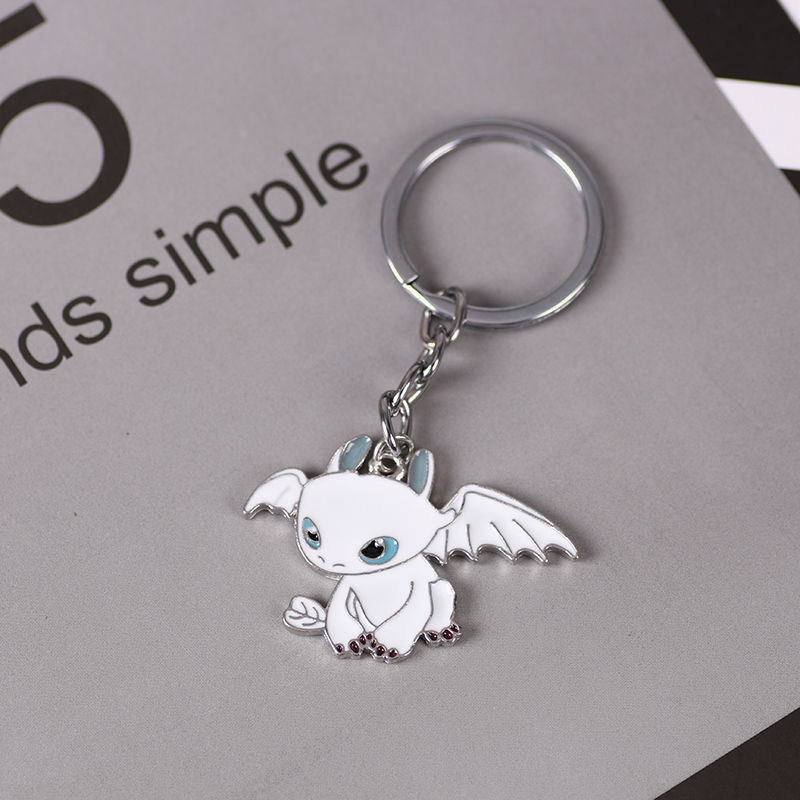 Trendy toy figurines, keychain pendants, creative and personalized key chains, keychain accessories, cool car car decorations, mobile phone bag pendants Specification image