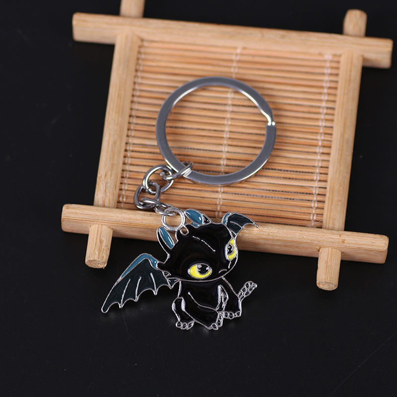 Trendy toy figurines, keychain pendants, creative and personalized key chains, keychain accessories, cool car car decorations, mobile phone bag pendants Application Scenario