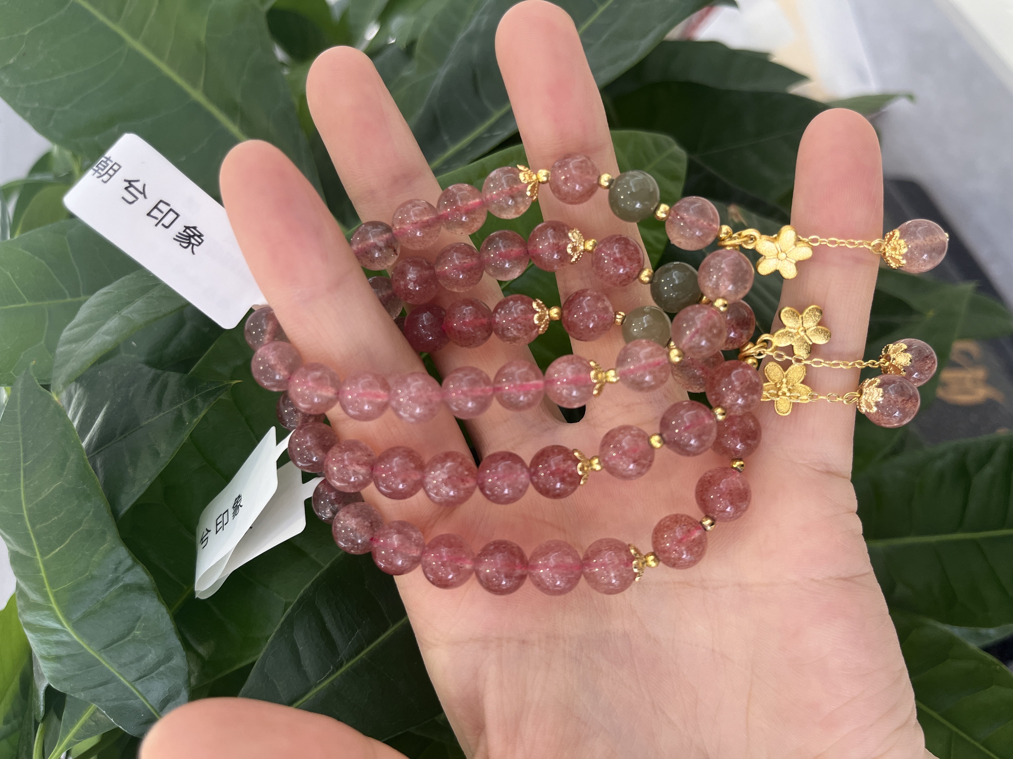 A unique and fashionable accessory for women, a strawberry crystal bracelet
