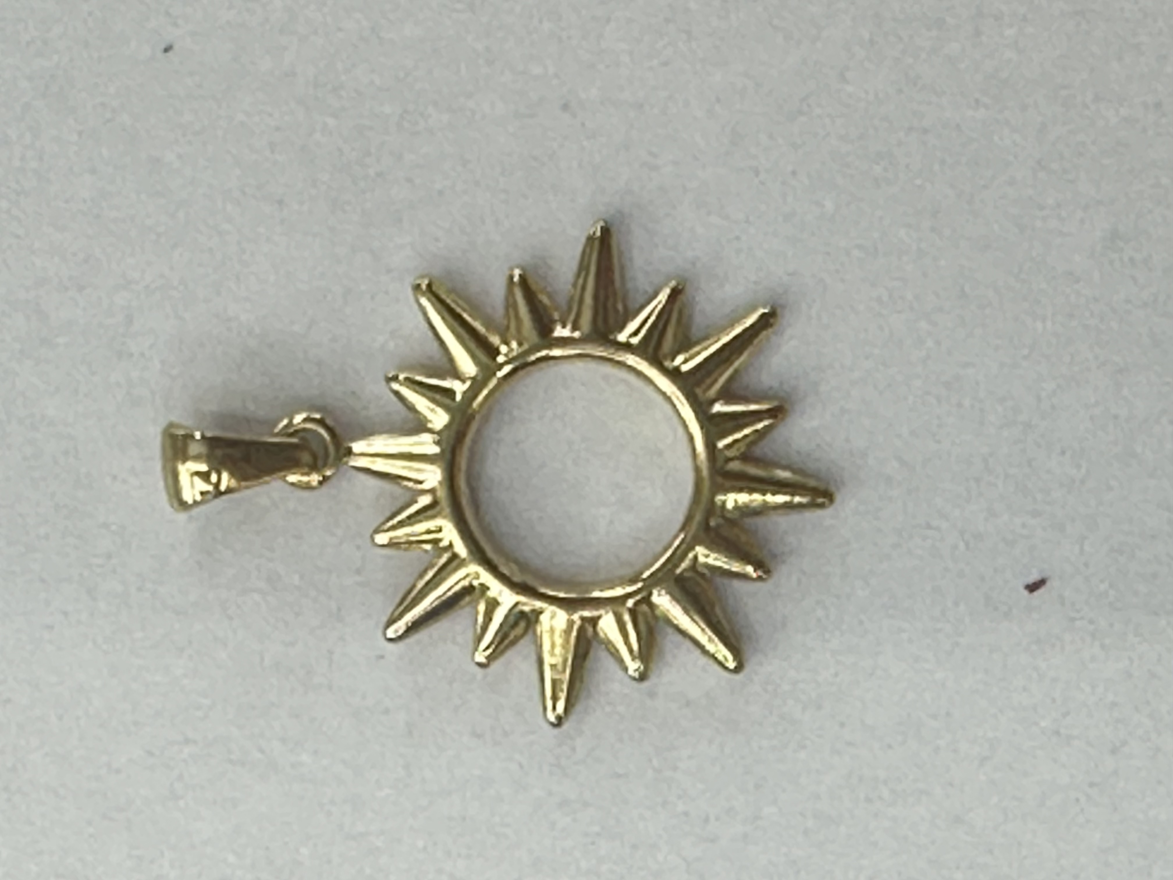 Stainless steel sun pendant