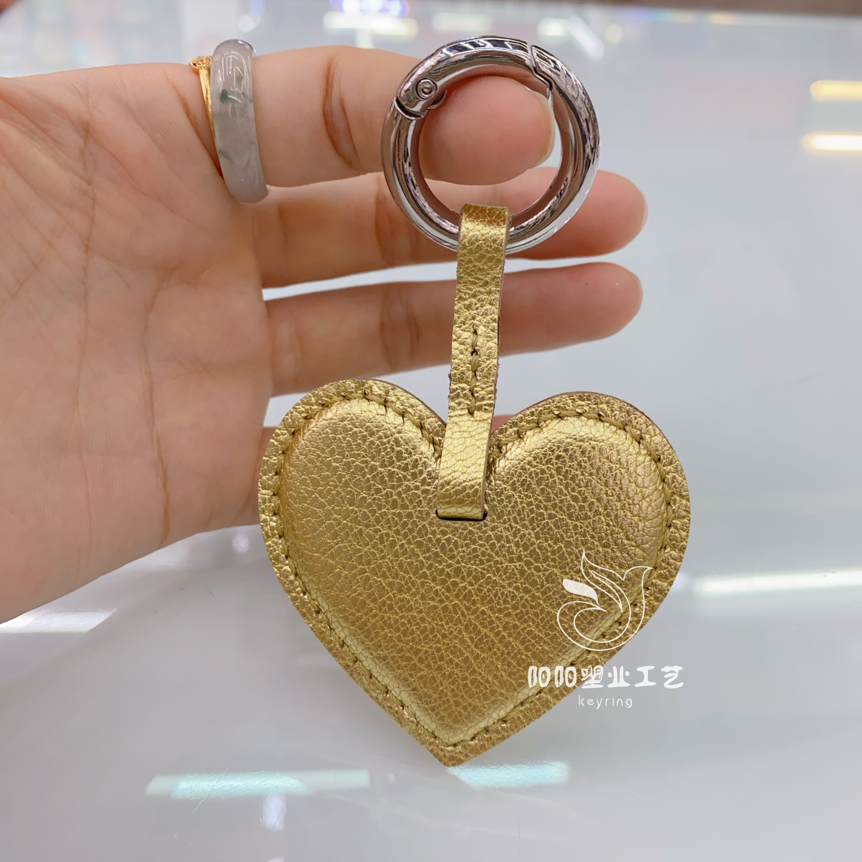 爱心皮革钥匙扣印字真皮皮质心形钥匙链挂饰刻logo商务礼品广告钥匙扣轮子钥匙扣编织绳车钥匙扣编织绳车钥匙扣产品图