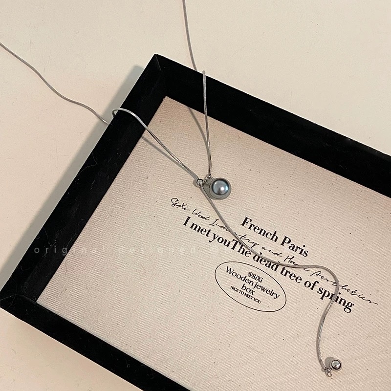 Silver grey pearl snake bone necklace for women's autumn and winter, adjustable long sweater chain, light luxury and niche hoodie accessory Item Picture