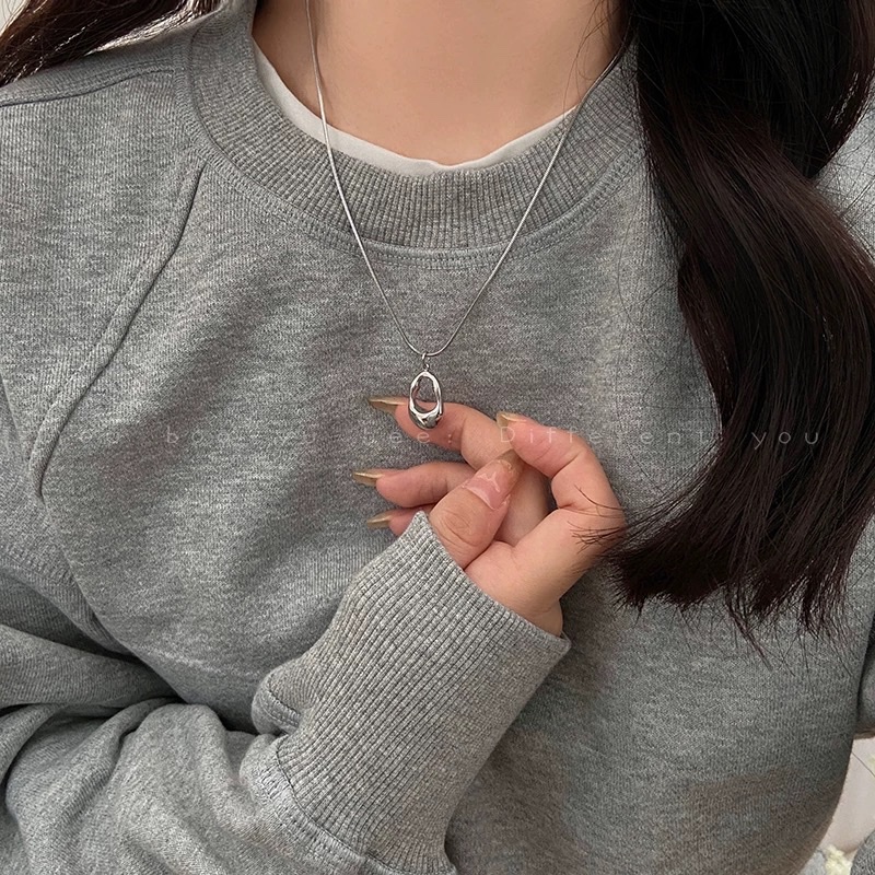 Silver water drop pendant necklace for women, long, light luxury, niche titanium steel, non-fading decorative sweater chain, high-end accessory Specification image